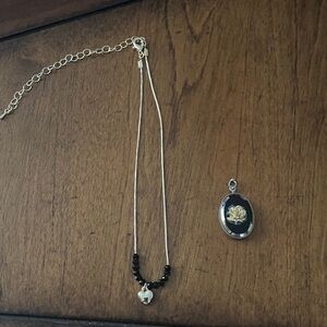 Elegant Black and Golden toned Pendant Necklace